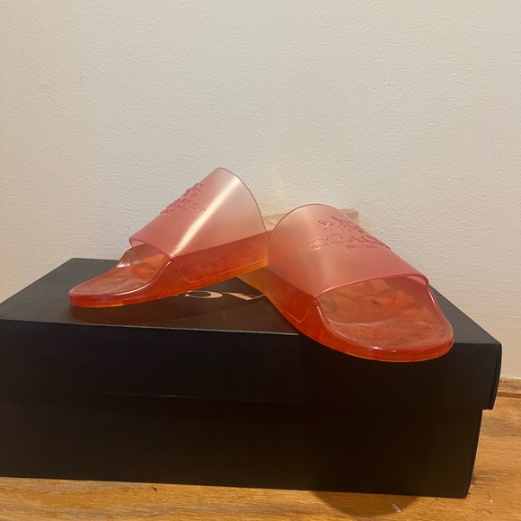 Pair of Coach Pink slides never worn. They are a size 6. Perfect gift idea. - Picture 2 of 4